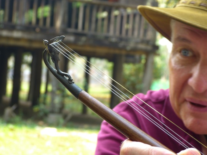 Ancient musical instruments.  That IS an elephant carved on the end of that bow
