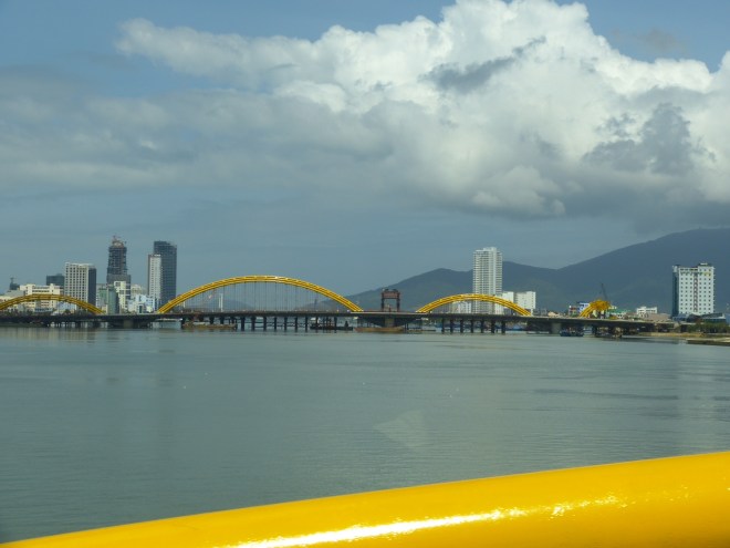 Modern DaNang, with its new bright yellow serpent bridges.