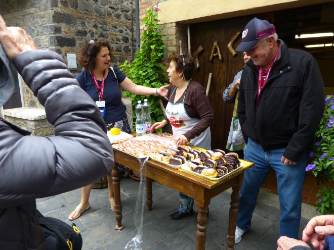 Anna, our fantastic tour guide, and Radicofani's delightful shopkeeper.