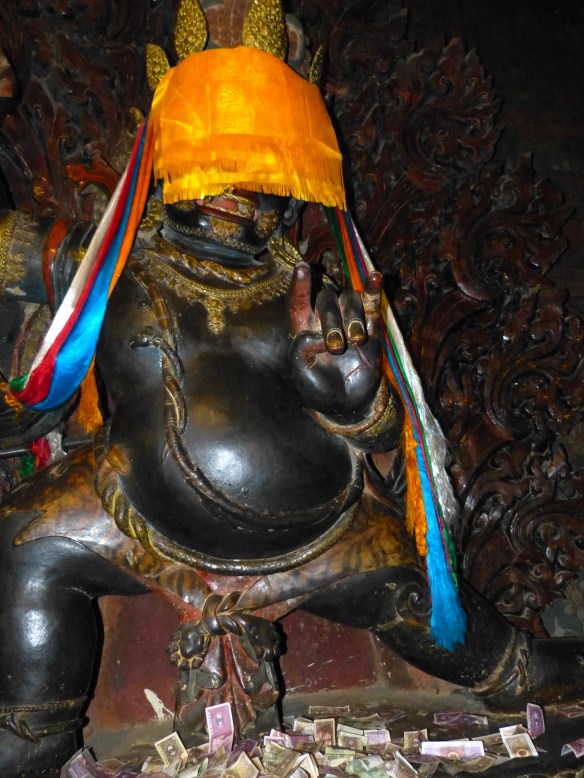 I asked why this statue's face was covered. Our guide said he can only be seen by those that complete a complex list of devotional activities.